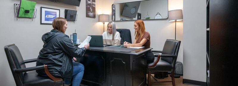 Therapists on the computer at Freeman
