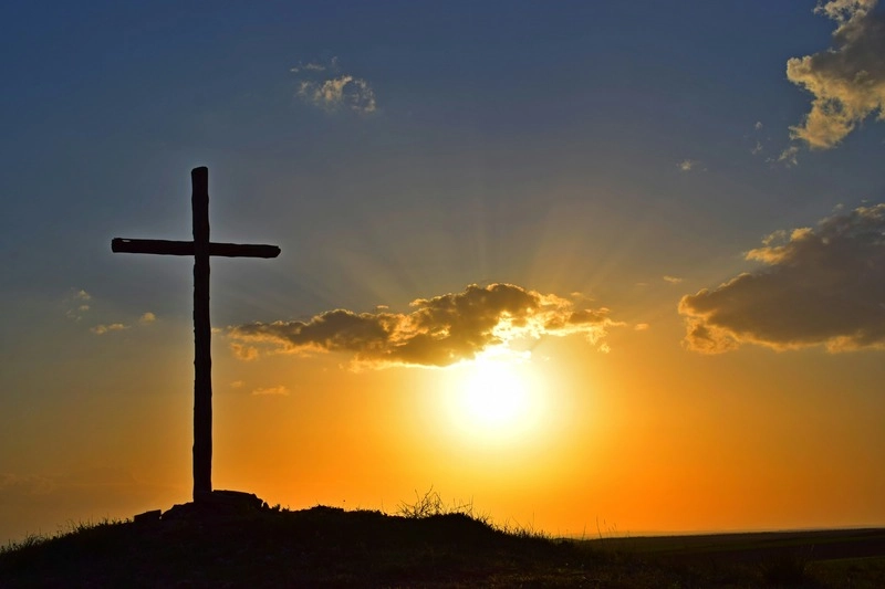 Online Chritian Rehab Programs 1 Christian cross in front of a sunset